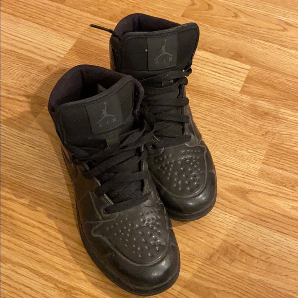 Black Anodized Air Jordan in 5Y or 6 Women
